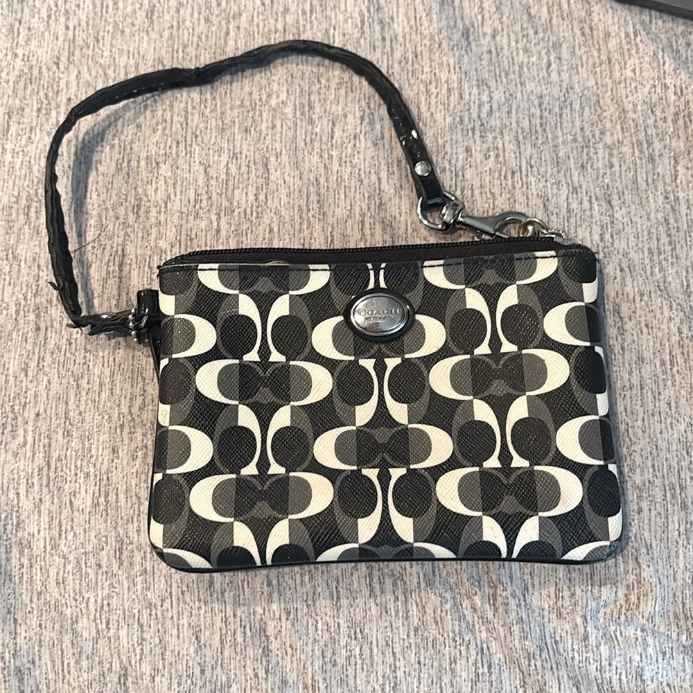 Coach black and white wristlet